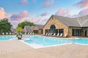 Overland Park townhouse for rent - Enjoy our beautiful outdoor swimming pool and sundeck with chairs at Pointe Royal in Overland Park, KS