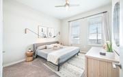 Savannah apartment for rent - a bedroom with a bed and two windows at The Baxly, Georgia