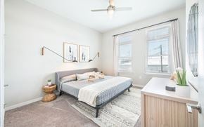 Savannah apartment for rent - a bedroom with a bed and two windows at The Baxly, Georgia