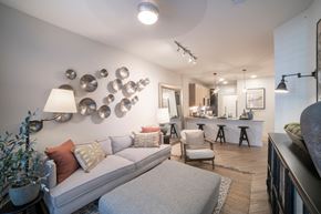 Lewisville apartment for rent - Living Room With Kitchen at Station at Old Town, Lewisville, TX