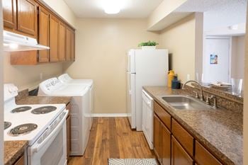 Kitchen with wooden cabinets