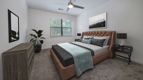 Atlanta apartment for rent - The Hendrix Apartments bedroom with bed and ceiling fan at The Hendrix, Atlanta