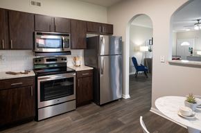 Houston apartment for rent - Modern Kitchen with Stainless-Steel Appliances  located at Retreat at Steeplechase in Houston, TX 77065