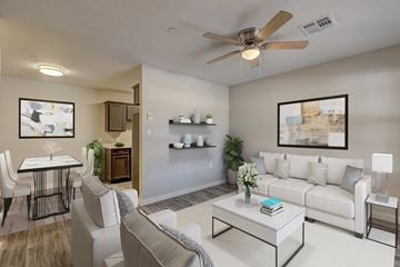 Oklahoma City apartment for rent - A living room with a white couch and a coffee table.