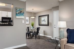 Georgetown apartment for rent - A modern dining room with a glass table and chairs.