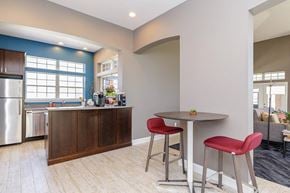 Manchester apartment for rent - A kitchen with a table and chairs.