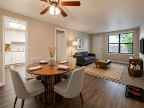 Stow apartment for rent - A dining room with a round table and chairs.