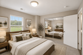 Centerville apartment for rent - A bedroom with a large bed and a mirrored closet door.