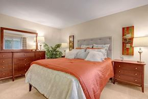 Elgin apartment for rent - a bedroom with a bed and a mirror