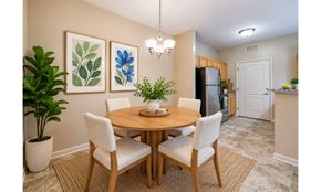 Mebane apartment for rent - A dining room with a round table and chairs.