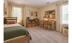 Fayetteville apartment for rent - A bedroom with a bed, desk, and chair.