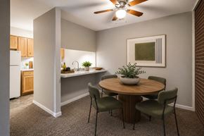Kettering apartment for rent - A dining room with a round table and chairs.