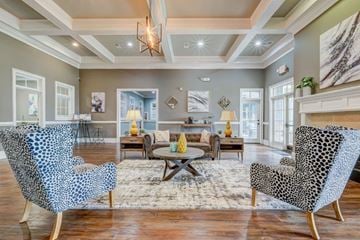Augusta apartment for rent - a living room with furniture and a fireplace