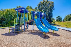Salisbury apartment for rent - a playground with two slides at a park