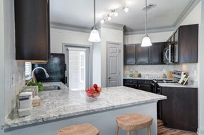Mcdonough apartment for rent - a kitchen with a counter top and a sink