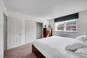 Carlisle apartment for rent - a bedroom with a bed and a window