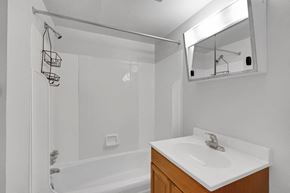 Carlisle apartment for rent - a bathroom with a sink and a shower