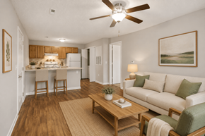 High Point apartment for rent - A living room with a couch, chairs, and a coffee table.