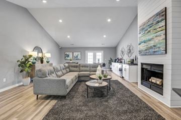 Huntersville apartment for rent - a living room with a couch and a fireplace