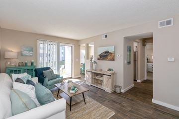 Indianapolis townhouse for rent - a living room with a couch and a table