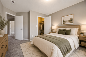 Kannapolis apartment for rent - A bedroom with a large bed and a painting on the wall.