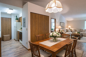 Akron apartment for rent - A dining room with a wooden table and chairs.