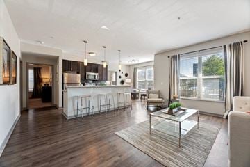 New Albany apartment for rent - a living room with a kitchen and a table