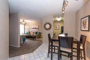 Manchester apartment for rent - A dining room with a table and chairs.
