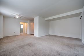 Allentown apartment for rent - A spacious room with carpeted floor and white walls.