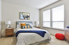 Saint Charles apartment for rent - bedroom with carpet and large windows
