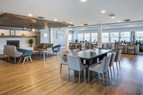 Indianapolis townhouse for rent - A modern dining room with a large table and chairs.