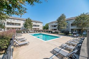 Charlotte apartment for rent - our apartments have a swimming pool with lounge chairs