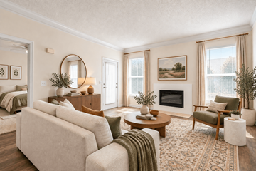 Memphis apartment for rent - A living room with a fireplace and a painting on the wall.