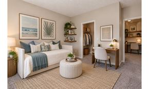 Fayetteville apartment for rent - A cozy bedroom with a bed, desk, and chair.