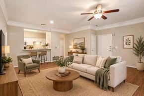 Lancaster townhouse for rent - A living room with a white couch, a coffee table, and a ceiling fan.