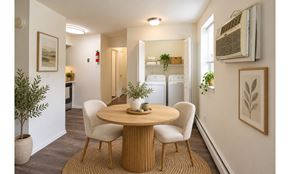 Allentown apartment for rent - A dining room with a round table and chairs.
