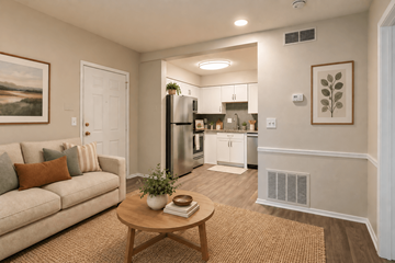 Columbia apartment for rent - A living room with a couch, a coffee table, and a painting on the wall.