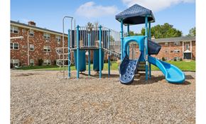Lansdale apartment for rent - A blue playground structure with a slide and a tower.