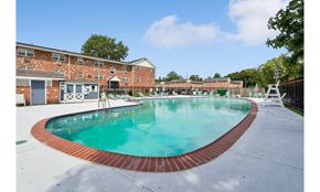 Lansdale apartment for rent - A small pool with a red brick border.