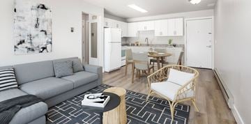 Salt Lake City apartment for rent - a living room with a couch and a table