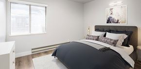Salt Lake City apartment for rent - Bedroom with hardwood flooring, white walls, and a window