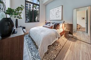 Plantation apartment for rent - bedroom with bed and two side tables