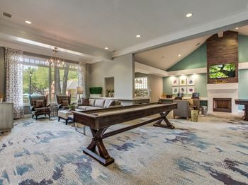 Resident lounge with pool and shuffleboard tables