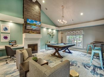 Resident lounge with pool and shuffleboard tables