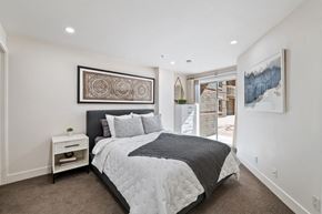 Salt Lake City apartment for rent - Bedroom with queen size bed, patio entrance