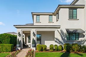 Mesa townhouse for rent - A modern house with a white exterior and a large front yard.