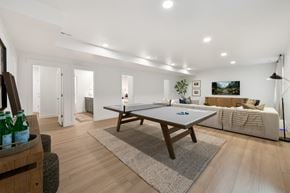 Saratoga Springs triplex for rent - A room with a pool table and a couch.
