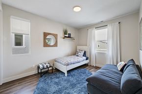 Riverton townhouse for rent - Furnished bedroom with wood plank flooring