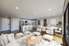 Salt Lake City apartment for rent - A modern living room with a white sofa set and a wooden coffee table.