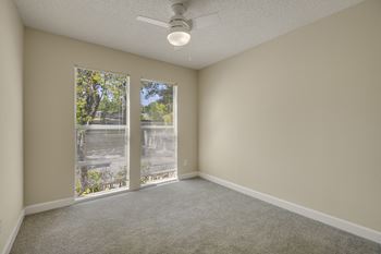Cozy bedroom with plush carpeting